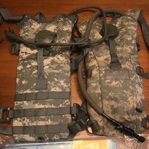Bundle of two Army issue camelbaks, cleaning kit, and winter gloves